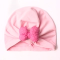 Dettaglio cappello a turbante per neonato con grande fiocco trapuntato rosa - Rosa