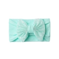 Detail of mint green baby headband with sparkling sequined mesh bow and soft elastic fabric - Mint Green