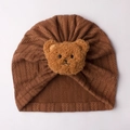 Detail of brown baby turban hat with soft plush bear embroidery and textured knit fabric - One Size / Brown