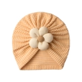 Orange waffle knit baby turban hat featuring a large cream fabric flower detail - Beige