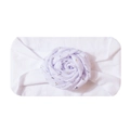 Detailed view of white elastic baby headband with silver star print fabric rose decoration - White