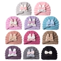 Multiple colors of knitted baby turban hats featuring cute plush bunny ears and bows - Mixed Colors Pack