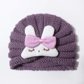 Detail of purple knitted baby turban hat with a cute plush rabbit and pink silk bow tie - Taro Purple