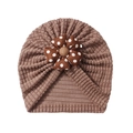 Detailed view of baby turban hat featuring brown waffle knit and large polka dot flower - Coffee