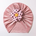 Pink velvet baby turban hat featuring a large polka dot flower and soft thermal fabric - Dusky Pink