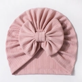 Detailed view of pink rib-knit baby turban hat with a soft decorative fabric bow - Taro Purple