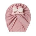 Dettaglio del cappello a turbante rosa per neonati con coniglietto e fiocco bianco - Rosa Antico