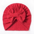 Cute red waffle knit baby hat featuring a large decorative bow for newborns and infants - Red