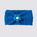 Detailed macro view of the knitted baby headband with a handmade crochet blue flower detail - Blue