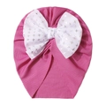 Close-up of pink ribbed baby hat featuring a white chiffon bow with silver sequin stars - One Size / Purplish Red