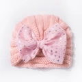 Rosa Strickmütze für Babys mit großer Tüllschleife und silbernen Glitzersternen - Einheitsgröße / Nute Rosa