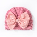 Rosa gestrickte Babymütze mit großer weicher Schleife und glänzendem Vogelmuster - Einheitsgröße / Altrosa
