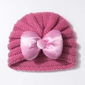 Bonnet bébé en tricot rose fuchsia avec grand nœud en satin pour l'hiver - Rose Poudré