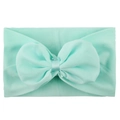 Dettaglio della fascia in nylon verde menta con grande fiocco in chiffon per neonati - Verde Menta