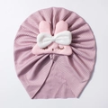 Close-up of pink ribbed baby beanie featuring a plush bunny face and bow tie - Dusky Pink