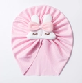 Pink ribbed infant turban hat featuring a cute white rabbit doll with 3D bow decoration - Pink