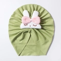 Close-up of green ribbed baby turban hat with a cute handmade 3D plush rabbit detail - Green