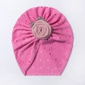 Close-up of pink baby hat with hollow floral lace and large 3D fabric rose decoration - Rose Red