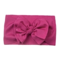 Soft ribbed baby headband in rose pink featuring a large layered double bow tie - Fuschia