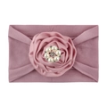 Detailed view of dusty rose baby nylon headband featuring a large satin flower and pearls - Taro Purple