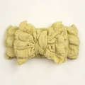 Creative baby bow headband in bright yellow bubble fabric with soft texture and chic design - Beige