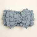 Detailed view of dust blue baby headband with bubble texture fabric and bow knot - Gray