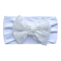 Close-up of white baby headband with soft elastic nylon fabric and delicate lace bow detail - White