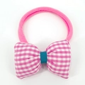 Detail of pink plaid bow baby nylon headband with teal knot on a white background - Pink