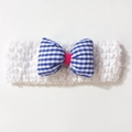 Close-up of white elastic baby headband with blue checkered bow and rose red knot - White