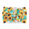Elastisches Baby-Stirnband mit Sonnenblumenmuster und großer Schleife aus Waffelstrick - Grün
