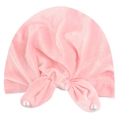 Pink velvet baby knot hat featuring soft fabric and elegant pearl embellishments - Pink