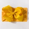 Fascia elastica giallo brillante per neonati con grande fiocco in gros-grain su bianco - Giallo
