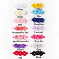 Dettaglio di 14 fasce per capelli in chiffon con fiori colorati e perle per neonati - Colori Misti