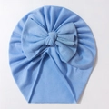 Detail of baby turban hat with a large bow in sky blue soft knitted fabric - Blue