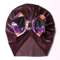 Detail of purple velvet Halloween baby turban with pumpkin bow and black bat wings decoration - Dark Purple