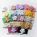Macro detail of soft knitted baby headbands featuring colorful polka dot 3D floral patterns - 17 Mixed Colors