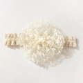 Detailed close-up of cream lace baby headband with layered mesh embroidery flower - Beige