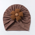Detailed view of dark brown baby turban hat with a large 3D fabric flower and soft texture - Coffee