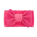 Macro detail of bright pink baby headband with textured ribbed bow design - Rose Red