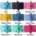 Set of nine colorful nylon baby headbands featuring soft ribbed elastic and big bows - 9 Colors Mixed (Order in Multiples)