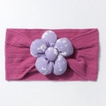Detailed texture of dark purple knitted baby headband with light purple floral fabric flower - Deep Purple