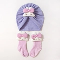 Détail du bonnet turban bébé en tricot gaufre mauve et chaussettes roses avec lapins - Violet