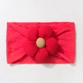 Close-up of bright red knitted baby headband featuring a large floral 3D jacquard decoration - Red