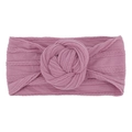 Dettaglio della fascia per neonati in nylon color malva con trama a trecce e nodo centrale - Viola Taro