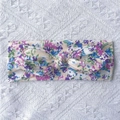 Floral print baby headband with rabbit ear knot detail on a white lace background - Purple Floral (A)