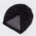 Close-up of black mesh baby turban hat with a large decorative bow and soft texture - Black