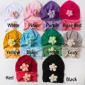 Flat lay of baby flower hat and headband sets in ten vibrant colors for girls - Multi-color Assortment