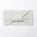 Detail of soft cream white cable-knit baby headband with elastic bow design - Gray