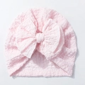 Pink infant turban hat featuring a large soft bow made of breathable waffle fabric - Light Pink