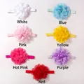Flat lay of seven multi-colored handmade chiffon flower headbands for newborn babies - Mixed 7 Colors